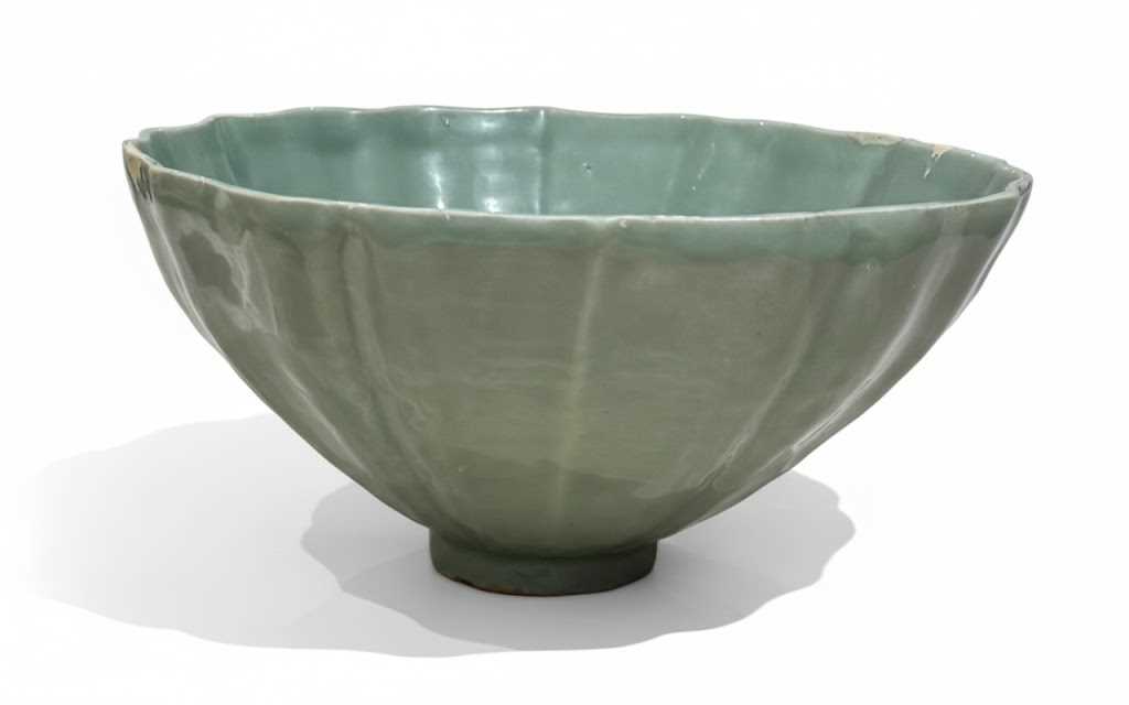Lot 167 - A large longquan celadon 'lotus' bowl