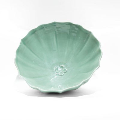 Lot 167 - A large longquan celadon 'lotus' bowl