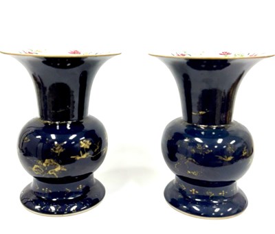 Lot 137 - A pair of blue ground and famille rose porcelain "Zhadou" vases