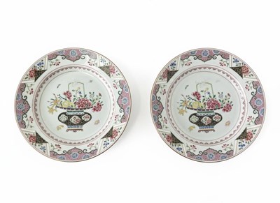 Lot 87 - An extremely rare pair of Chinese porcelain “napkin-border” plates or dishes, Famille Rose