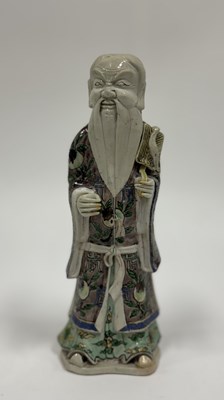 Lot 76 - A famille verte porcelain sculpture of an immortal