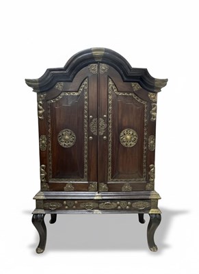 Lot 46 - A teak Dutch Colonial (indo-dutch) armoire/cabinet mounted with metal hardware and Matching box