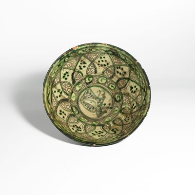 Lot 64 - A Samanid Sgraffito and Slip-Painted Ceramic Bowl