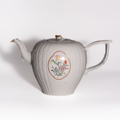 Lot 90 - A 'Famille Rose' Lobed and Molded Teapot and Cover